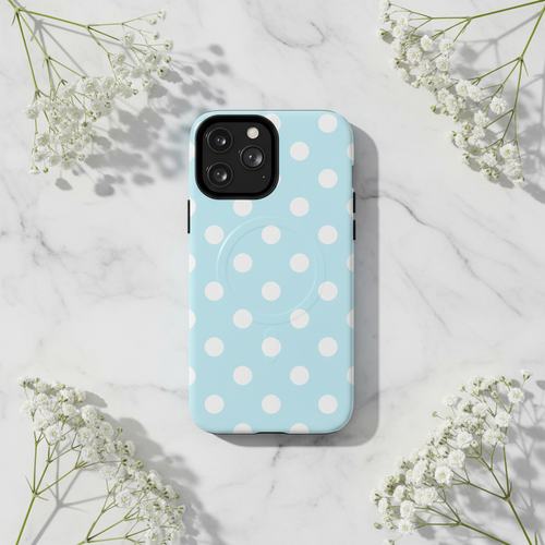 Blue polka dot phone case on marble with baby's breath